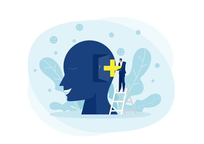 Businessman put Positive thinking sign on the big head human concept