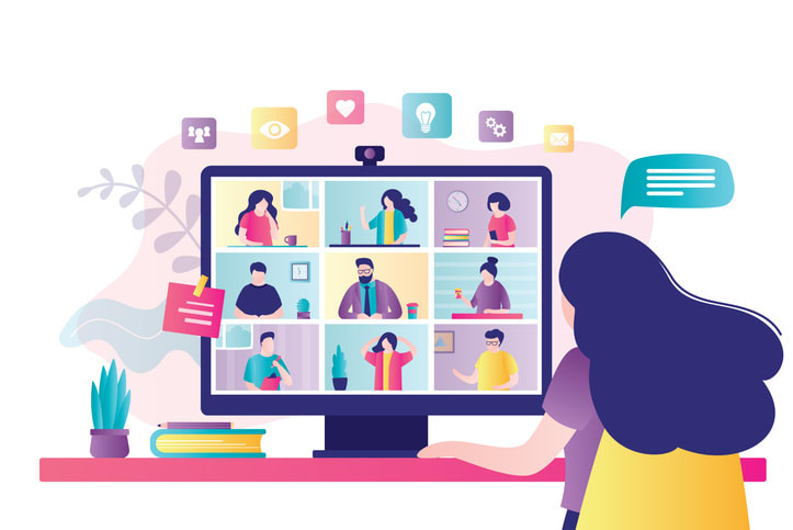 Woman communicates with colleagues via video call