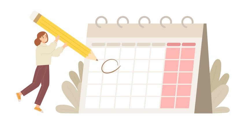 Young female holding big pencil and writing circle on huge calendar for planning important date